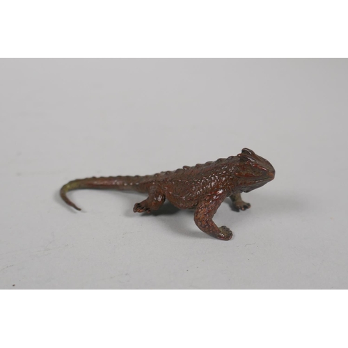 136 - A Japanese style bronze okimono horned lizard, 7cm