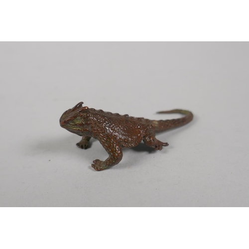 136 - A Japanese style bronze okimono horned lizard, 7cm