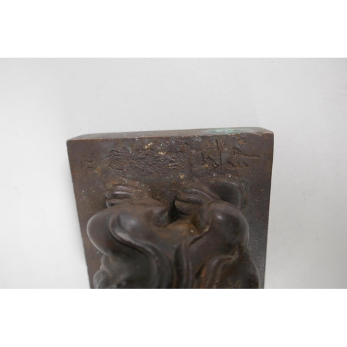 138 - A Chinese filled bronze seal with kylin knop, 8 x 8cm