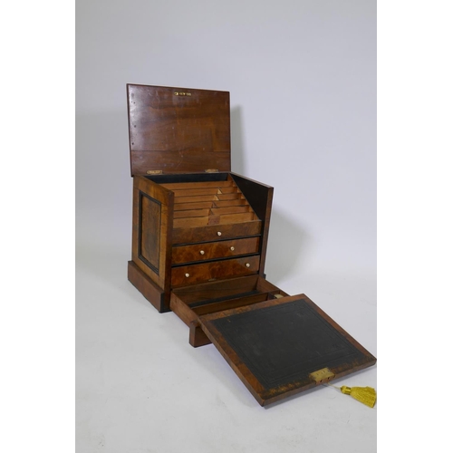 14 - A Victorian  burr walnut stationery cabinet, with lift up top and fitted interior over two draw... 