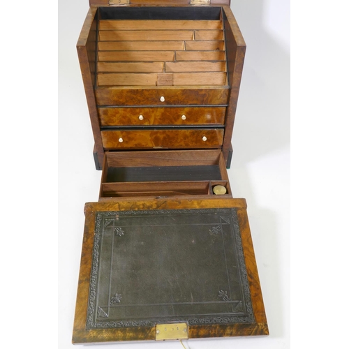 14 - A Victorian  burr walnut stationery cabinet, with lift up top and fitted interior over two draw... 