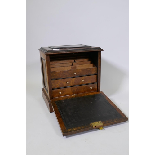 14 - A Victorian  burr walnut stationery cabinet, with lift up top and fitted interior over two draw... 