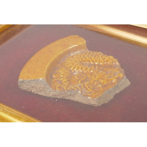 144 - A shard of amber glazed pottery roof tile depicting a dragon, purportedly from the Chinese Imperial ... 