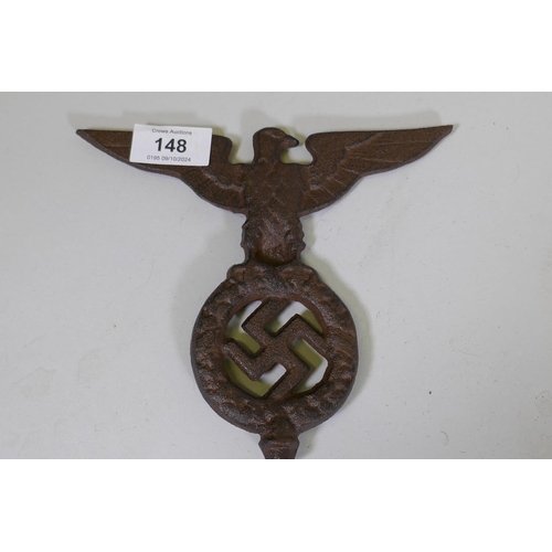 148 - A Third Reich cast metal mount, 16.5cm high