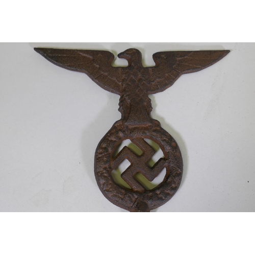 148 - A Third Reich cast metal mount, 16.5cm high