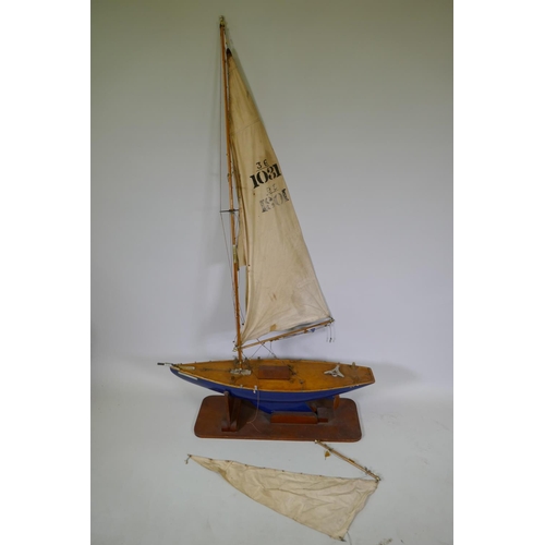 15 - A scratch built pond yacht, The Kingston Flyer', AF mast broken at base, length of hull 94cm