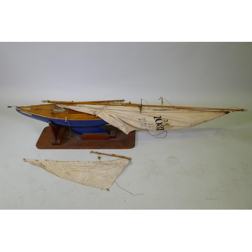 15 - A scratch built pond yacht, The Kingston Flyer', AF mast broken at base, length of hull 94cm