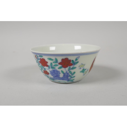 158 - A Chinese doucai porcelain tea bowl with chicken decoration, Chenghua 6 character mark to base, 8cm ... 