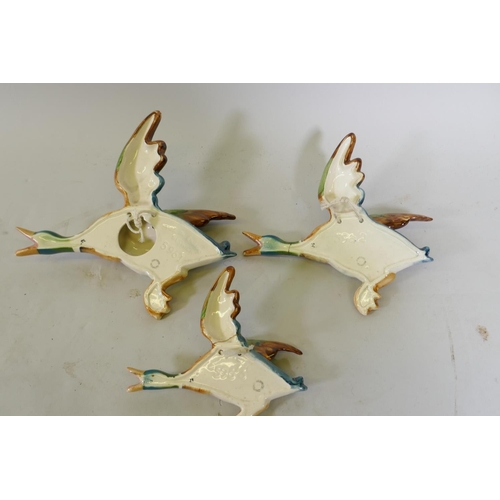 172 - Three Beswick flying mallard ducks, No. 5961, 5962, 5963, 62 and 63 repaired, 61 21cm long