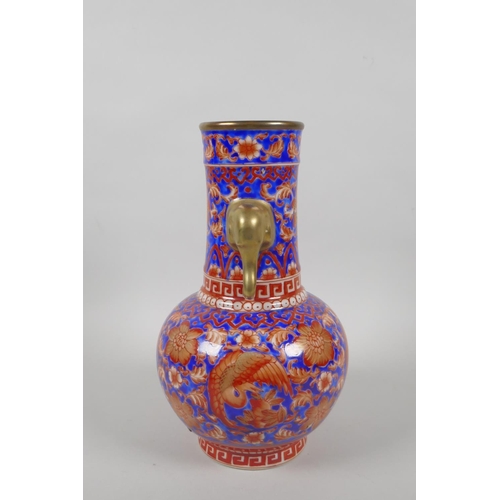 188 - A Chinese blue, red and white porcelain vase decorated with cranes, peaches and flowers, Qianlong se... 