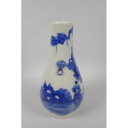 196 - A Chinese blue and white porcelain vase with two mask handles, decorated with figures in a landscape... 