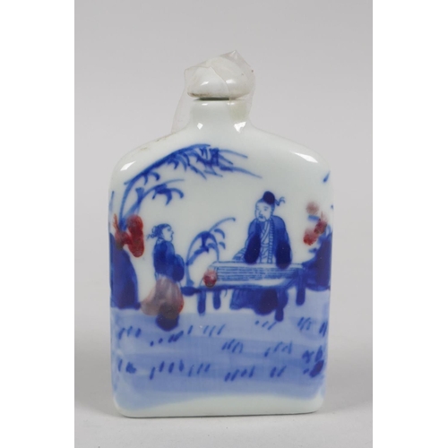 201 - A Chinese blue and white porcelain double gourd snuff bottle with scrolling floral decoration, and a... 