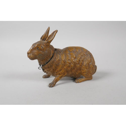 209 - An antique cold painted spelter money box in the form of a hare, 13cm long