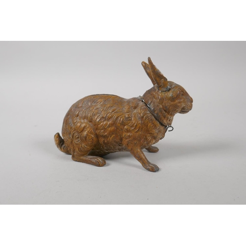 209 - An antique cold painted spelter money box in the form of a hare, 13cm long