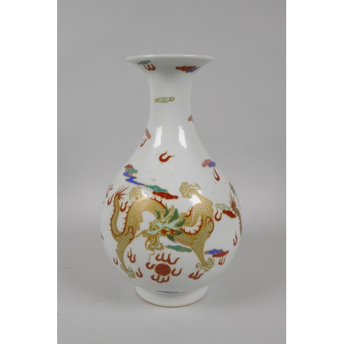 210 - A Chinese polychrome enamelled porcelain pear shaped vase decorated with gilt highlighted dragons, 6... 