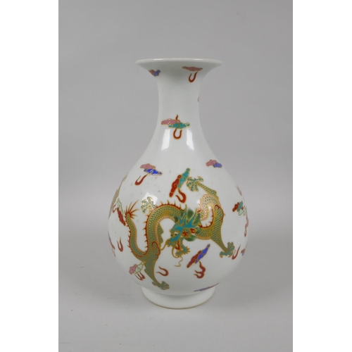 210 - A Chinese polychrome enamelled porcelain pear shaped vase decorated with gilt highlighted dragons, 6... 