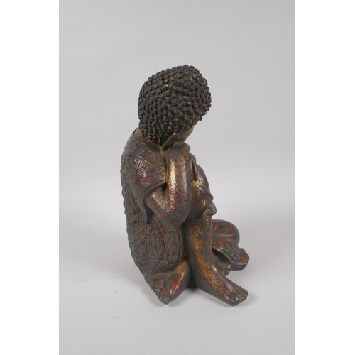 215 - A Chinese filled bronzed metal figure of Buddha with the remnants of gilt patina, 4 character mark t... 