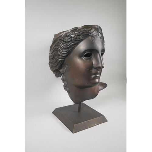 217 - A Greco-Roman style bronzed metal mask, 45cm high