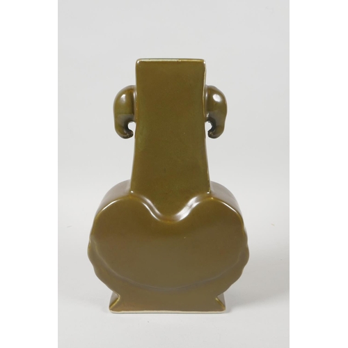 218 - A Chinese tea dust glazed porcelain vase with two mask handles, 6 character mark to base, 24cm high