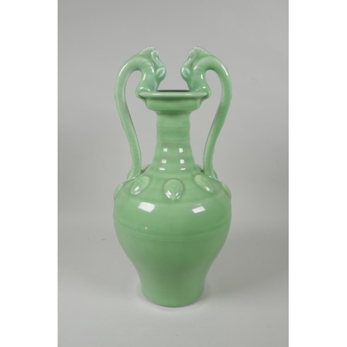 220 - A Chinese celadon glazed porcelain two handled vase, YongZheng seal mark to base, 35cm high