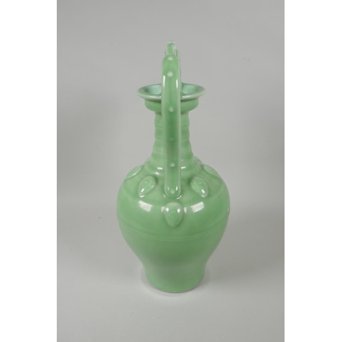 220 - A Chinese celadon glazed porcelain two handled vase, YongZheng seal mark to base, 35cm high