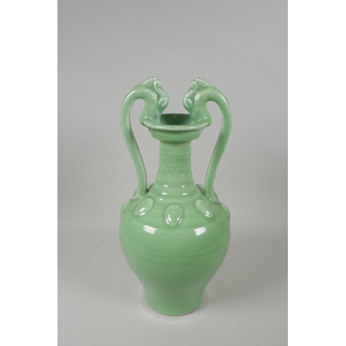 220 - A Chinese celadon glazed porcelain two handled vase, YongZheng seal mark to base, 35cm high