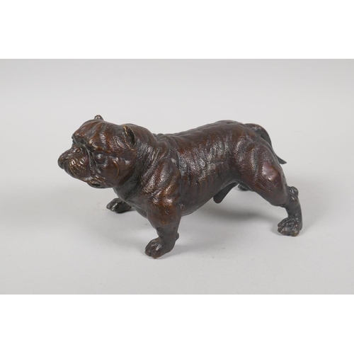 226 - A filled bronze figure of a bulldog, 19cm long