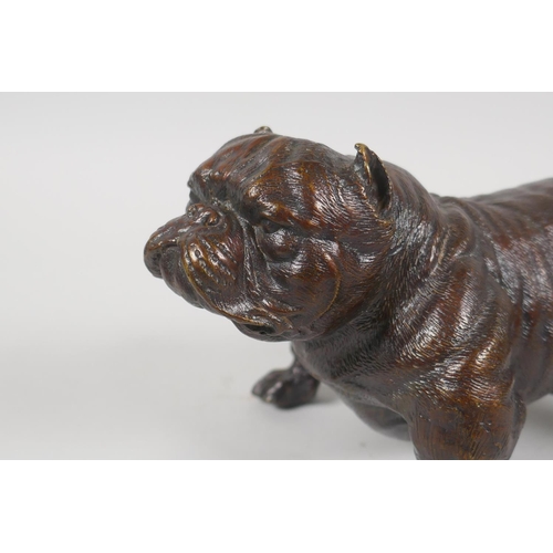 226 - A filled bronze figure of a bulldog, 19cm long