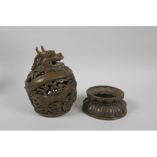 229 - A Chinese pierced bronze censer burner with dragon decoration, 6 character mark to base, 18cm high