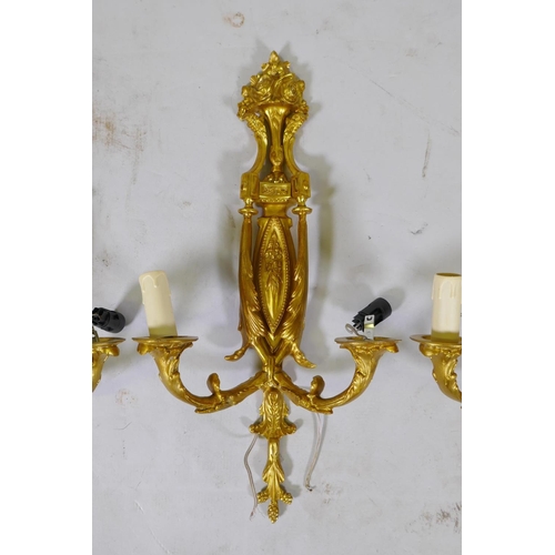 234 - Two pairs of ormolu two branch wall sconces, 50cm