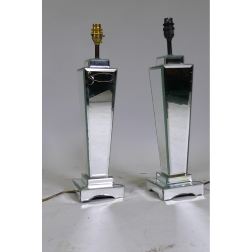 239 - A pair of mirrored glass table lamps, 49cm high