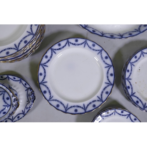 244 - A Furnivals flow blue Chippendale part dinner service, comprising twelve bowls, five dinner plates, ... 