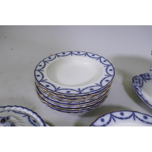 244 - A Furnivals flow blue Chippendale part dinner service, comprising twelve bowls, five dinner plates, ... 