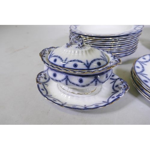 244 - A Furnivals flow blue Chippendale part dinner service, comprising twelve bowls, five dinner plates, ... 