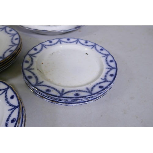 244 - A Furnivals flow blue Chippendale part dinner service, comprising twelve bowls, five dinner plates, ... 