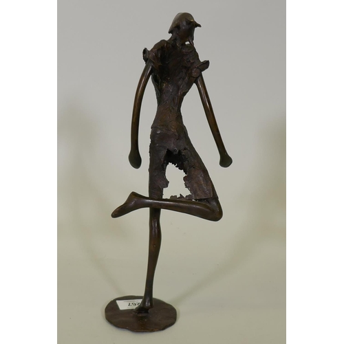 273 - An African Burkina Faso bronze figure of a dancer, marked TB?, 33cm high