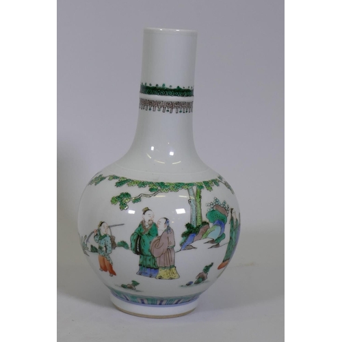 28 - A Chinese famille verte bottle shaped vase, with raised enamel decoration and six character Kanxi ma... 