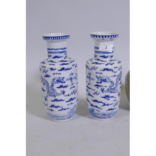 3 - A pair of Chinese blue and white dragon vases, four character mark to base, late C19th, 26cm high, a... 