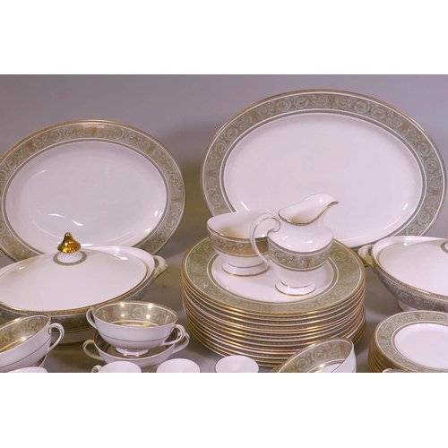 35 - A Royal Doulton English Renaissance H4972 pattern twelve place part dinner service with extra plates