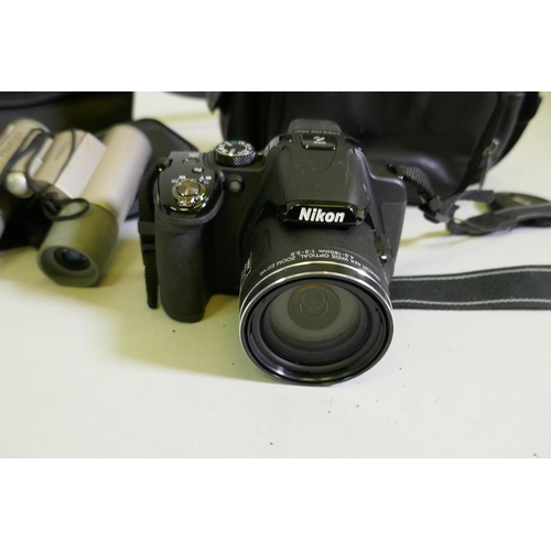 43 - Canon E-10 4 MegaPixel digital camera; Fuji Firepix S, 12 Mega Pixels; JVC GR-D21EK digital video ca... 