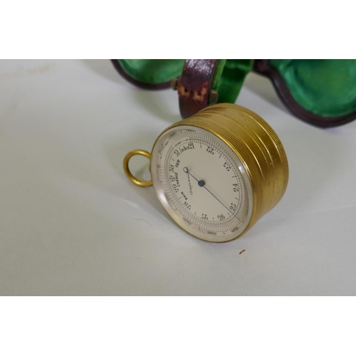 5 - A late C19th gilt brass pocket compensated aneroid barometer/compass, the barometer with rotating be... 