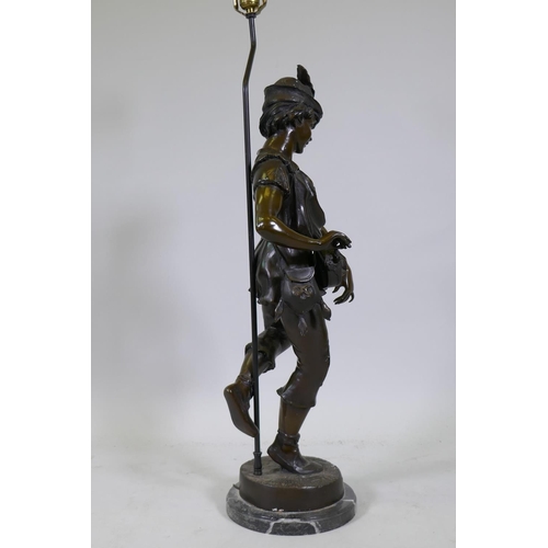 54 - After Jean Didier Debut, a bronze figure 'Joueur de Vielle', the Hurdy Gurdy Man, mounted on a marbl... 