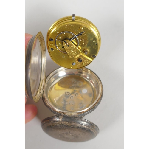 614 - Two silver cased pocket watches, a WWII British military pocket watch, and another