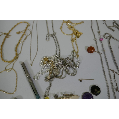 616 - A quantity of vintage costume jewellery including white metal belts and buckles