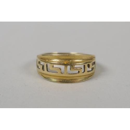 620 - Two 14ct gold snake rings and a 14ct gold Greek key design ring, and two other 14ct rings for scrap,... 