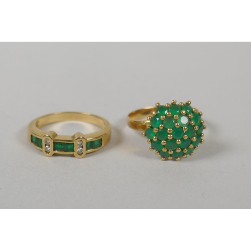 621 - A 14ct gold diamond and emerald dress ring, size M, and a gold and emerald cluster ring, marks rubbe... 