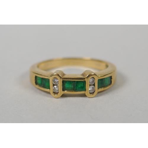 621 - A 14ct gold diamond and emerald dress ring, size M, and a gold and emerald cluster ring, marks rubbe... 