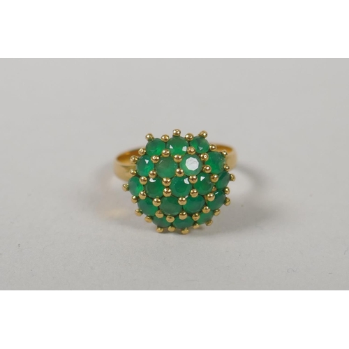 621 - A 14ct gold diamond and emerald dress ring, size M, and a gold and emerald cluster ring, marks rubbe... 