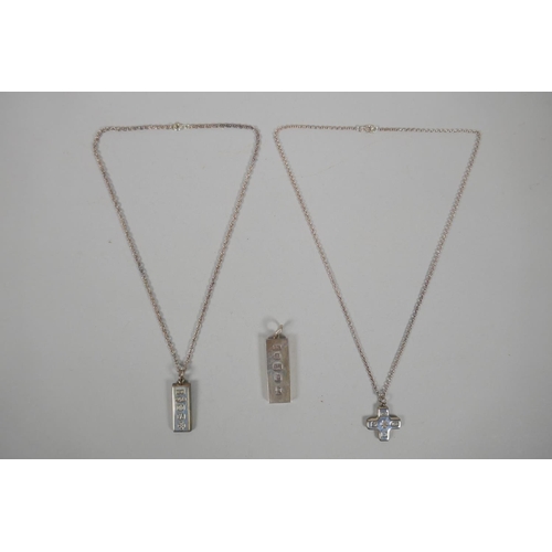 623 - Two hallmarked silver ingot pendant necklaces, and another hallmarked silver necklace, 67g total