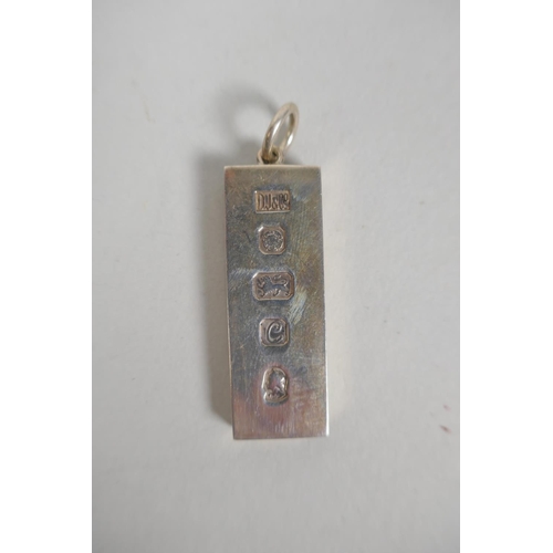 623 - Two hallmarked silver ingot pendant necklaces, and another hallmarked silver necklace, 67g total